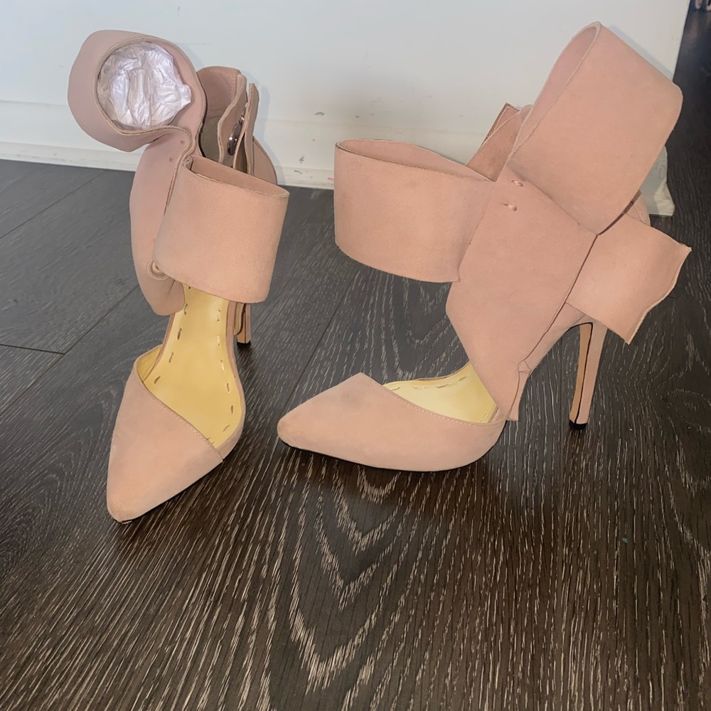 Amina Abdul Jillil baby pink heels